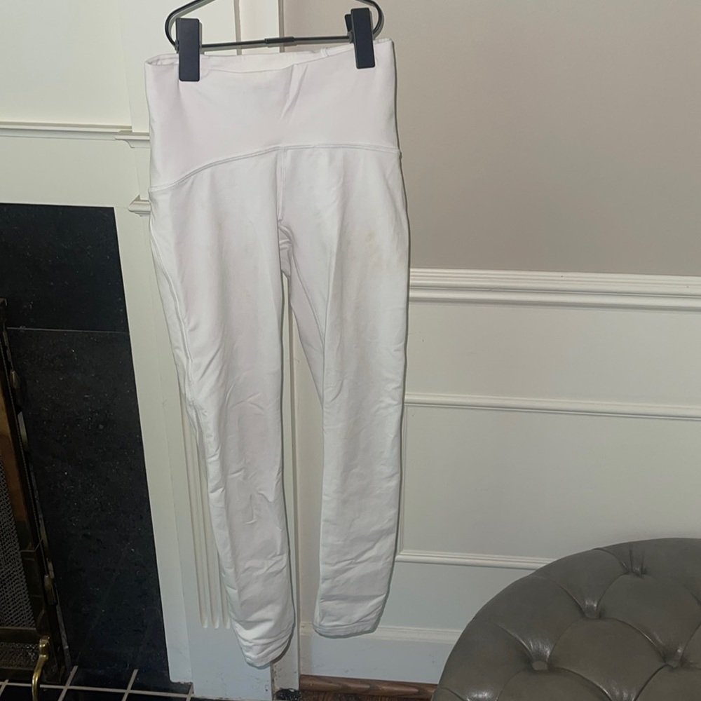 White cropped lululemon leggings with mesh on sides